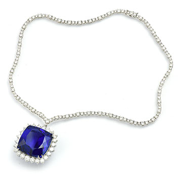 Sapphire and diamond pendant with a white gold chain.